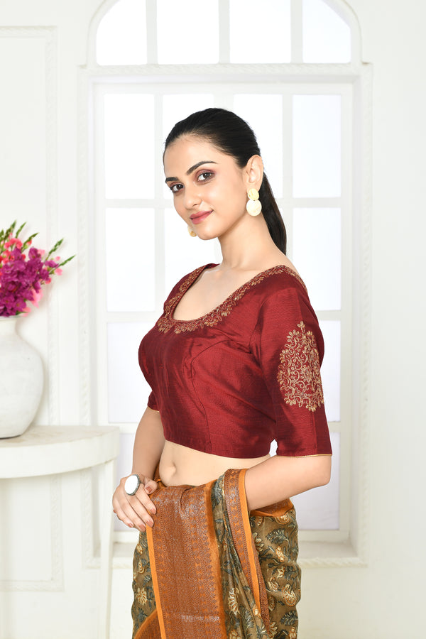 Dark maroon pure raw silk elbow length blouse with golden floral embroidery in sleeves, front and back neck.